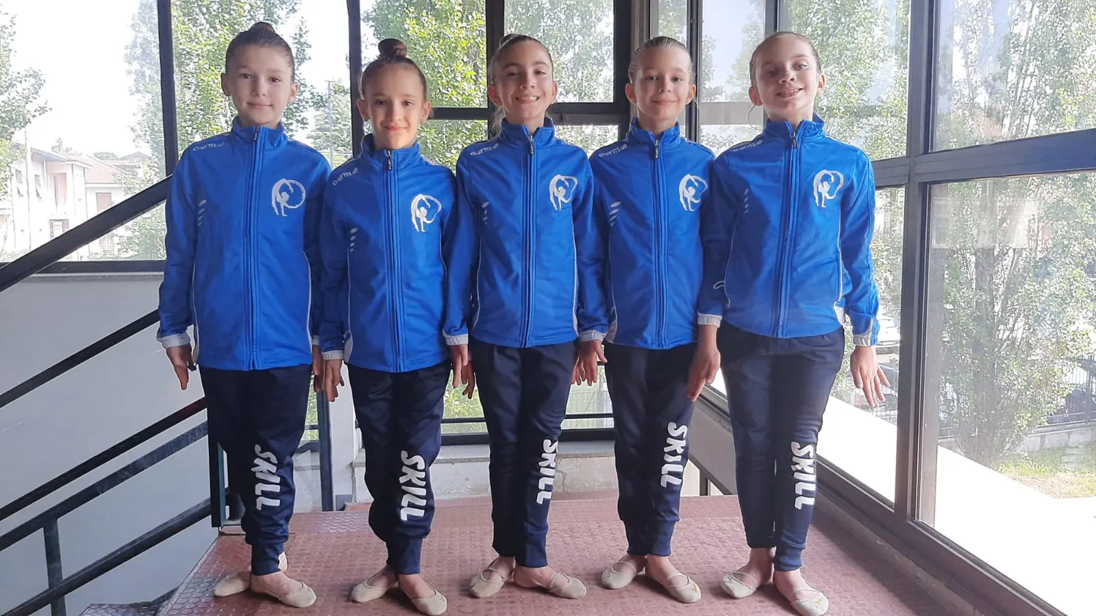 Squadra della Ginnastica Skill con la tuta azzurra della società